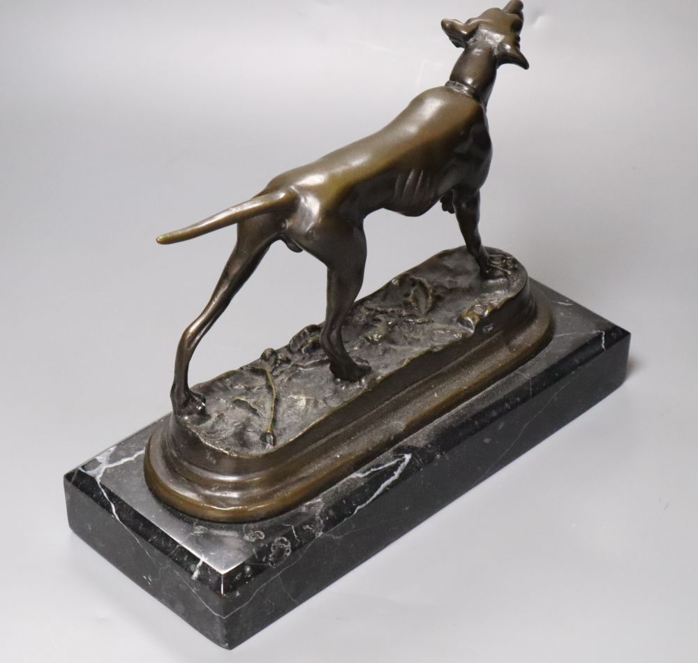 A bronze model of a pointer, unsigned, on marble plinth, length 31cm